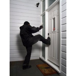 Kicking at door blocked by door security bar